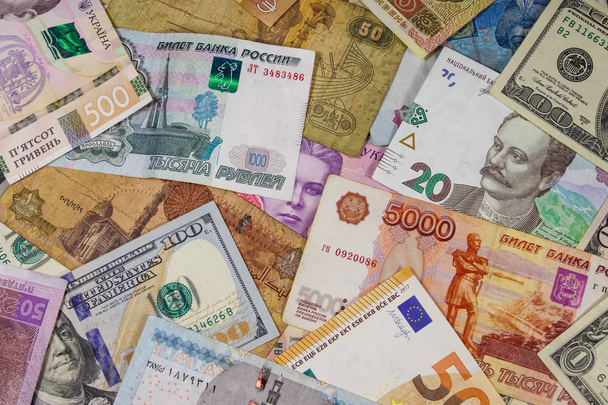 Wielokulturowe tło euro Nas dolary, ruble rosyjskie, funty egipskie i ukraińskie hrywny - Zdjęcie, obraz