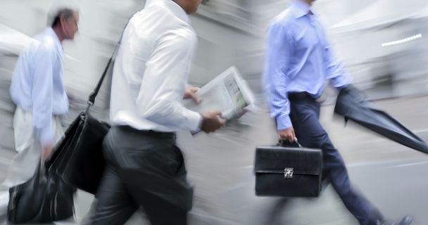 motion blurred business people walking on the street - Φωτογραφία, εικόνα