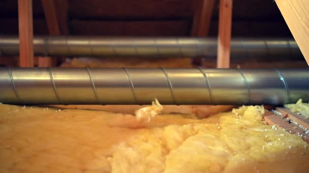 Construction Theme. House Attic Mineral Wool Insulation and Air Circulation Pipelines. - Footage, Video