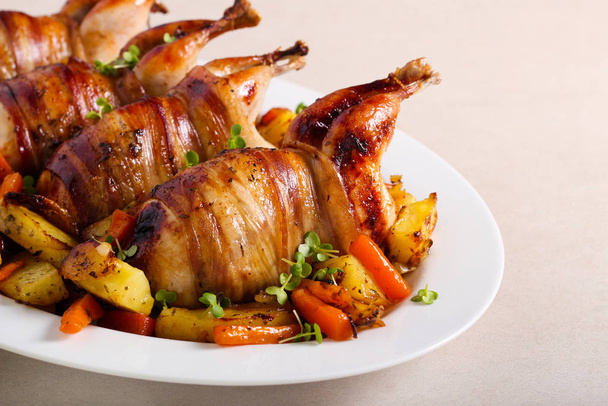 Roast Quails wrapped in bacon  - Photo, image