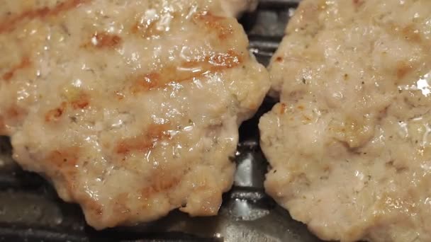 cutlets are fried in a pan, a lot of olive oil, fatty junk food, close-up - Footage, Video