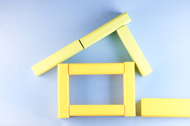 image of a house made of childrens wooden constructor - Photo, image