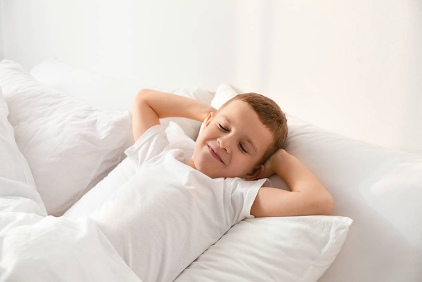 Cute little boy sleeping in bed at home - Foto, Imagem