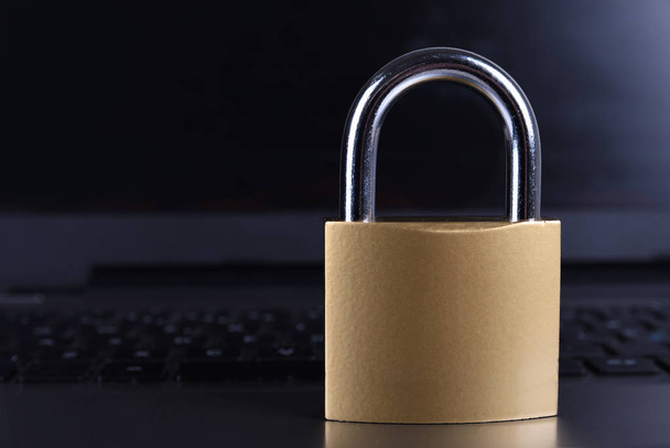 Padlock on computer keyboard. Internet data privacy information security concept. - 写真・画像