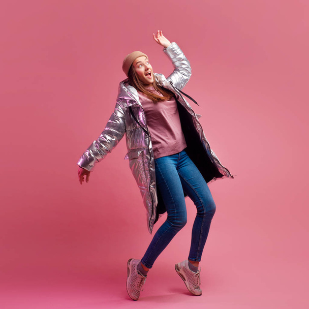 Trendy autumn and winter clothing, Studio shot on a pink background, copy space. - Foto, afbeelding