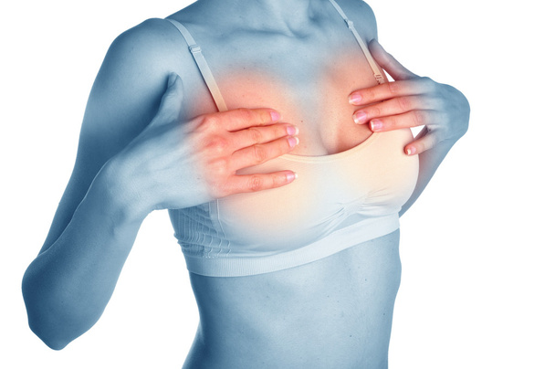 acute pijn in de borst van een vrouw. - Foto, afbeelding