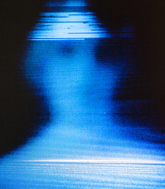 Blurred human silhouette on the screen. Glitch. - Zdjęcie, obraz