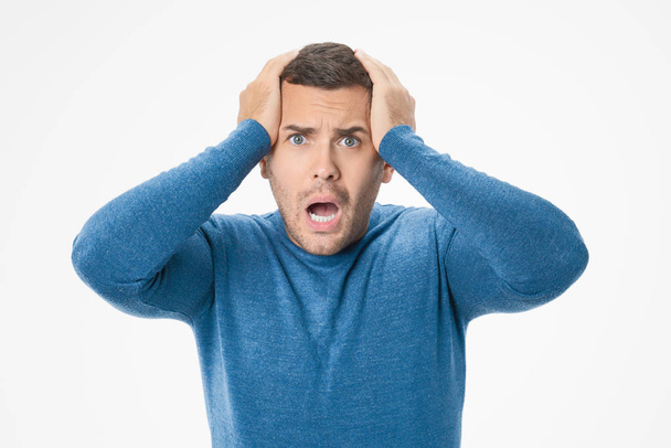 Portrait of worried and scared man isolated on white background - Photo, image