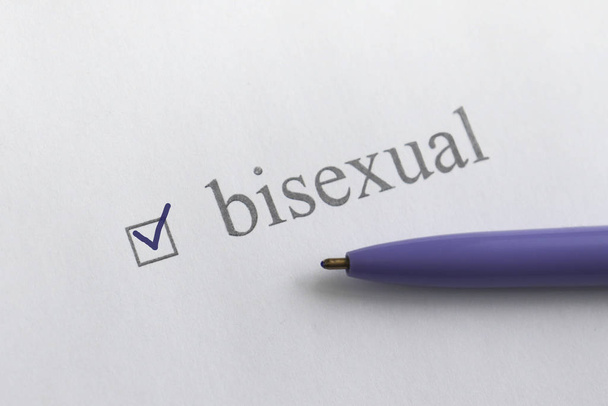 Bisexual- checkbox with a tick on white paper with pen. Checklis - Φωτογραφία, εικόνα