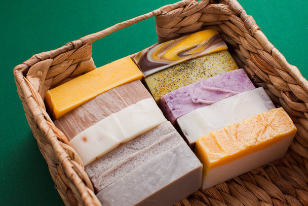 Basket with multicolored soap bars in eco shop - Фото, изображение