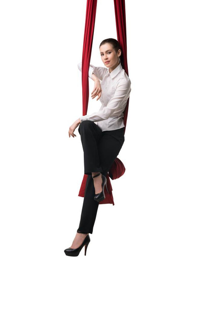 Business woman sitting on cloth isolated shot - Fotó, kép