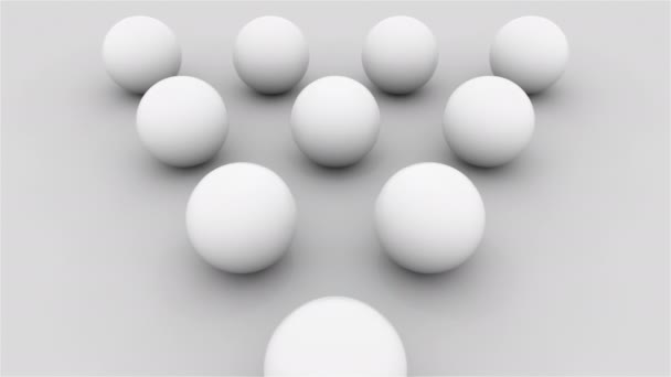 Computer generated composition of ten white balls lined with a triangle on a flat surface. 3d rendering isometric background - Záběry, video