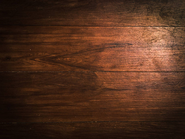 Brown soft wood surface as background for design. Vintage painted wooden texture, top view - Photo, Image