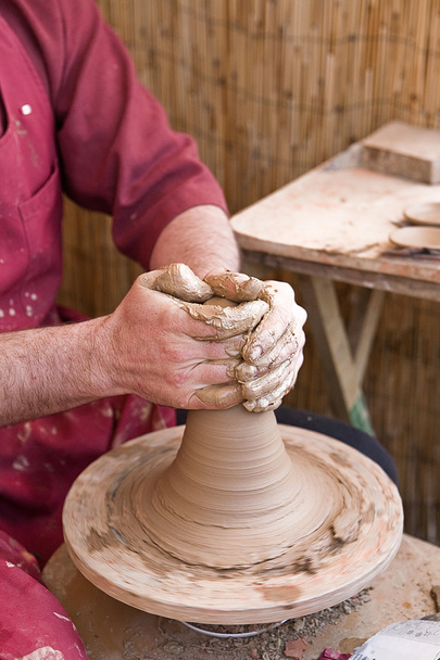 Potter hands on wheel at work, Spain - Photo, Image