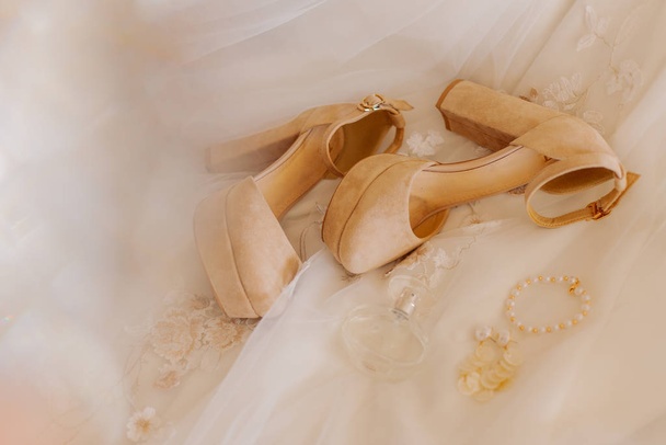 Beautiful wedding accessories of the bride. Happy wedding day. - Fotoğraf, Görsel