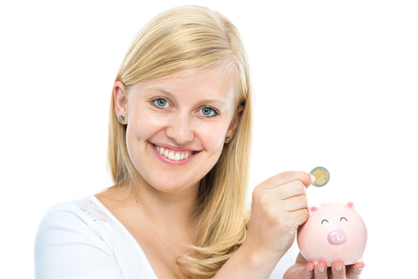 woman holding piggy bank - Fotoğraf, Görsel