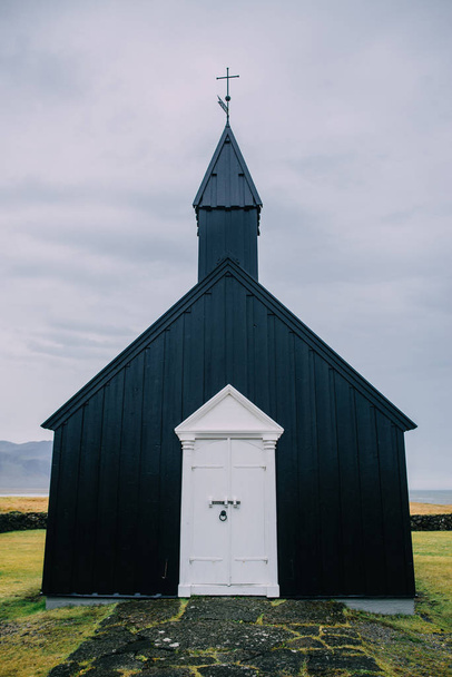 Facade of the black church, Iceland. - Foto, Imagem