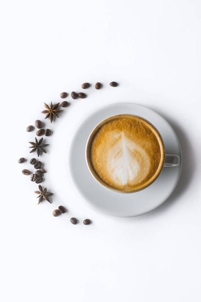 Coffee and grains of coffee on a white background. cappuccino co - Φωτογραφία, εικόνα