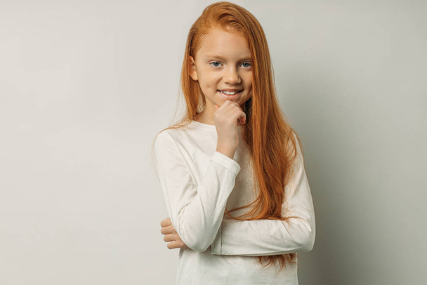 sweet little girl with natural red hair isolated - Zdjęcie, obraz