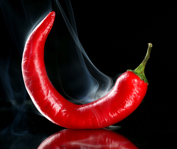 Red hot chili pepper isolated on black - Photo, Image