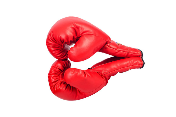 Pair of red leather boxing gloves or mitt isolated on white back - Foto, afbeelding