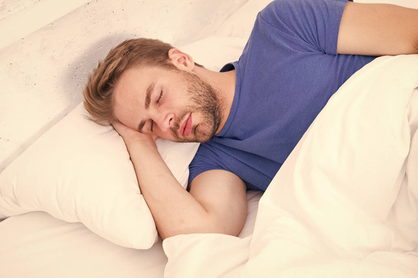 Tips sleeping better. Man handsome guy sleeping. Get enough amount of sleep every night. Bearded man sleeping face relaxing. Maintaining consistent circadian rhythm is essential for general health - Fotografie, Obrázek