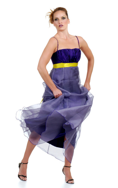 Woman dancing in a purple lace dress - Foto, Bild