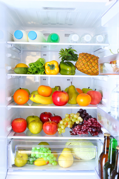 Refrigerator full of food - Фото, зображення