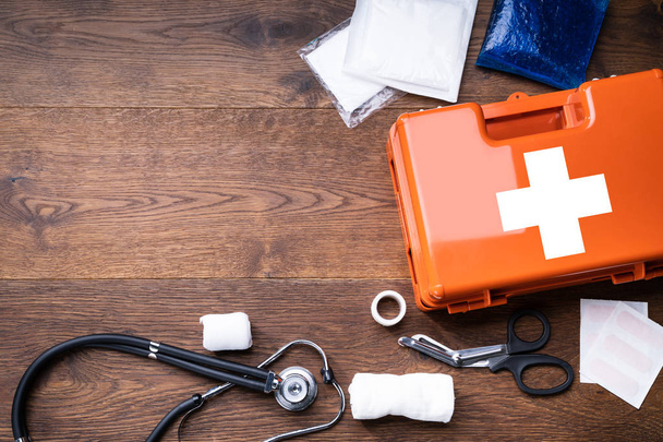 First Aid Kit With Medical Equipment On Wooden Background - Photo, Image