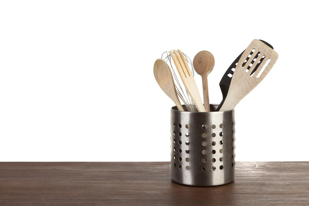Contenedor con utensilios de cocina
 - Foto, Imagen