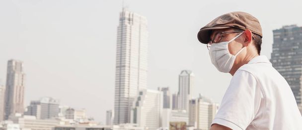 Hombre asiático de mediana edad con gafas y mascarilla médica, Wu
 - Foto, Imagen