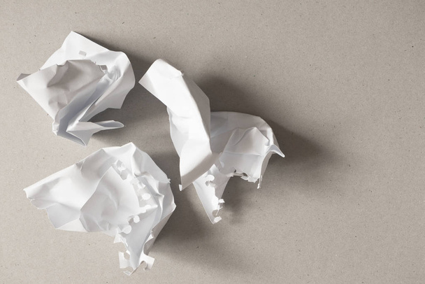 Crumpled paper balls from notebook with copy space on gray backg - Photo, Image