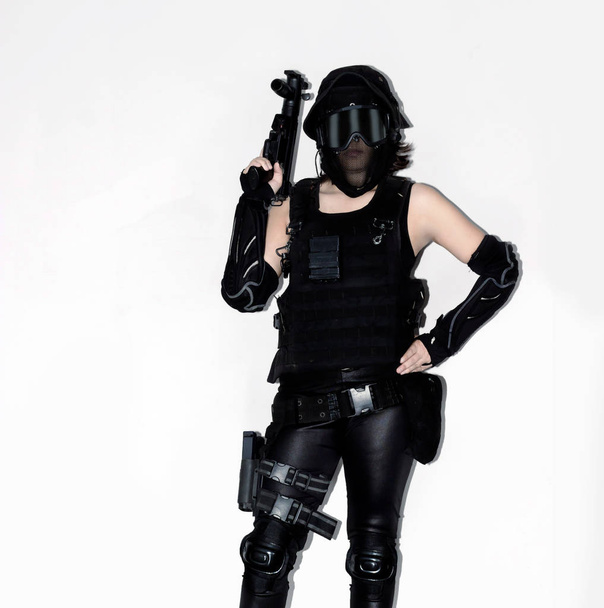 asian lady in black soldier bb gun sport game costume and weapon - Photo, Image
