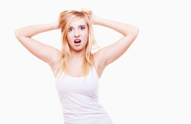 Stress. Young woman frustrated pulling her hair on white - Foto, Imagem