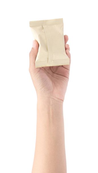mano che tiene cibo sacchetto di plastica snack isolato su un Backgrou bianco
 - Foto, immagini