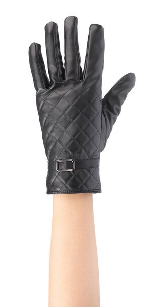 Σύμβολο δράσης του χεριού με μαύρα χειμωνιάτικα δερμάτινα γάντια  - Φωτογραφία, εικόνα