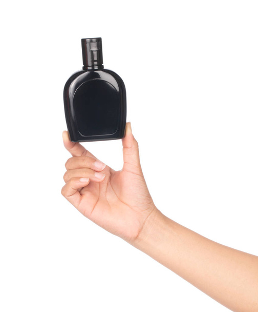 mão segurando garrafa cera proteção do produto para carro e couro i
 - Foto, Imagem