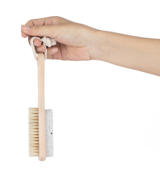 Cepillo de mano con herramienta de higiene de pies de matorral aislado o
 - Foto, Imagen
