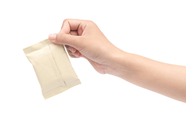 kéz gazdaság Élelmiszer snack műanyag zacskó izolált egy fehér Backgrou - Fotó, kép