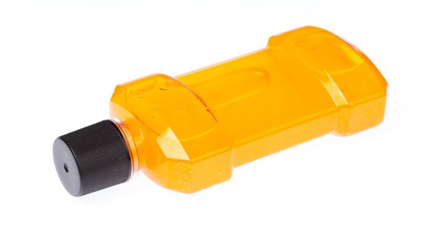 fles munt oranje mondwater geïsoleerd op witte achtergrond - Foto, afbeelding