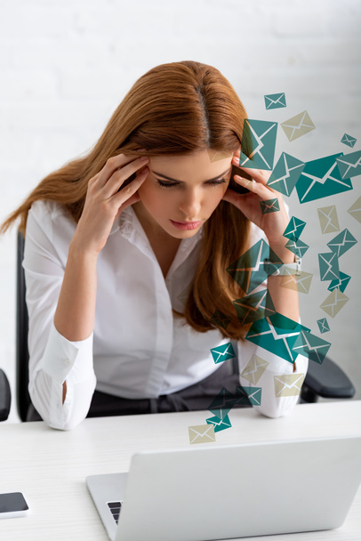 Pensive businesswoman with hands near head looking at laptop on table, mail illustration - Photo, Image