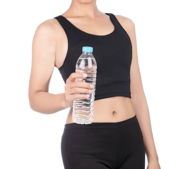 молодая спортсменка с бутылкой воды, изолированной на белой ба
 - Фото, изображение