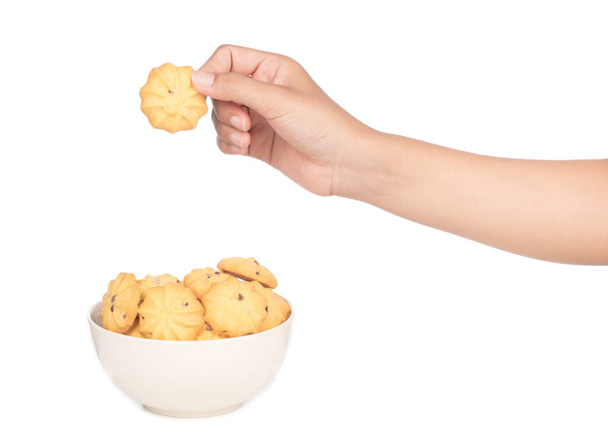 hand holding bowl of Chocolate chip cookies isolated on white ba - Photo, Image