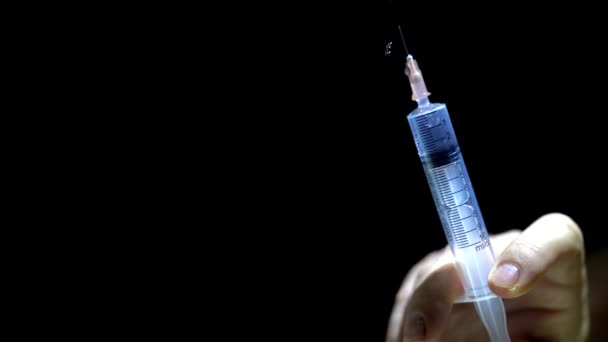 drug addict a syringe. injection, medications,  Copy Space - Materiał filmowy, wideo