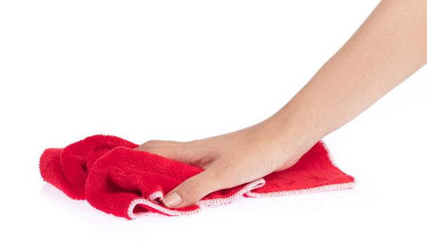 ręka z czerwonymi chusteczkami mikrofibry izolowane na białym tle - Zdjęcie, obraz