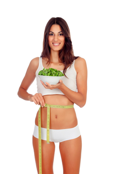 lány a salátával és a mérőszalag fehér fehérnemű - Fotó, kép