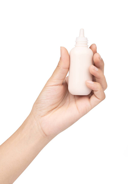 hand holding makeup liquid foundation isolated on white backgrou - Photo, Image