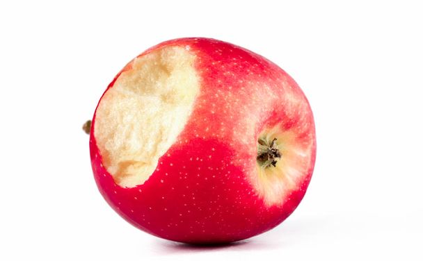 Manzana mordida roja. Sobre fondo blanco
 - Foto, imagen