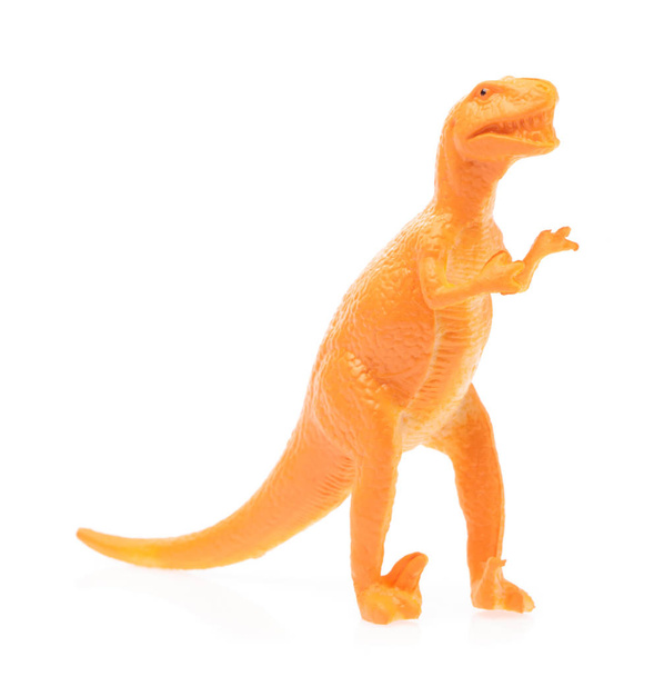 brinquedo pequeno dinossauro isolado no fundo branco
 - Foto, Imagem