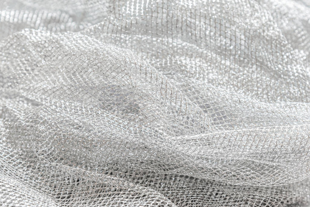 abstract background of silver mesh fabric close up - Photo, image
